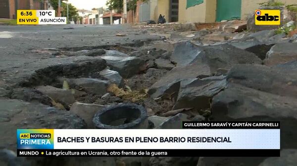 Baches y basura en pleno barrio residencial - ABC Noticias - ABC Color