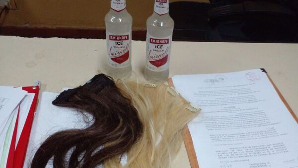 Doña quiso meter a Tacumbú dos alargues de cabello y smirnoff para su hijo