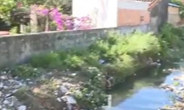 Arroyo "Morotĩ" con aguas negras y basura - C9N