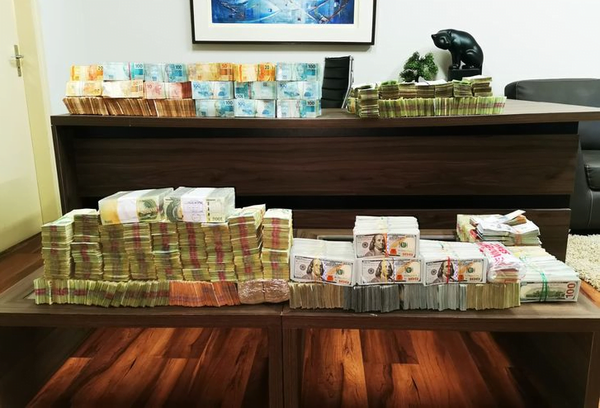 Hallan 1,5 millones de dólares de presumible lavado de dinero en allanamientos - Noticiero Paraguay