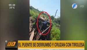 Tras derrumbe de puente, nativos cruzan el río Aquidabán en tirolesa