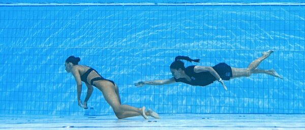 Andrea Fuentes, entrenadora y salvavidas en los Mundiales de natación