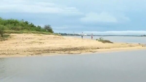 Hallan cuerpo de joven desaparecida en el río y siguen buscando a otros