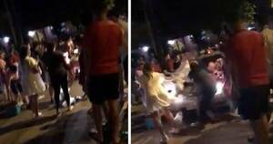 [VIDEO] Automovilista atropelló a cinco jóvenes que estaban farreando en plena calle