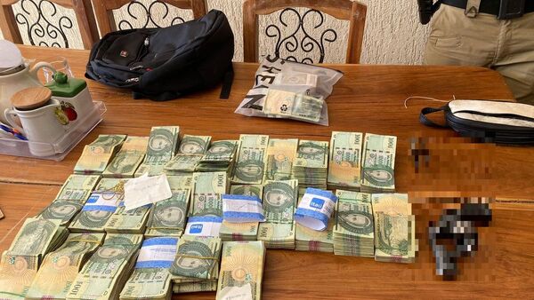 Incautan G. 289 millones y detienen a dos personas