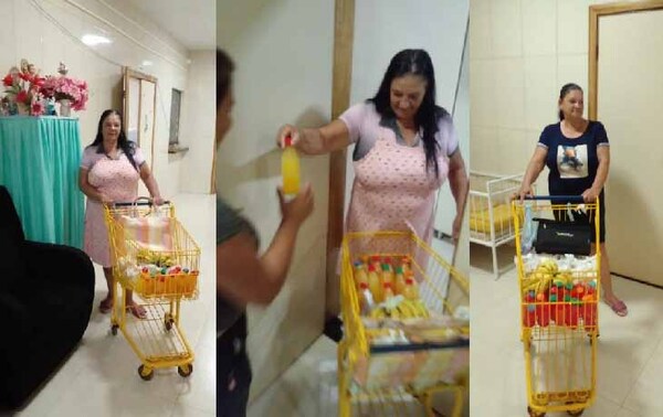 Mujer reparte comida en el puesto de salud de Santa Rita – Prensa 5