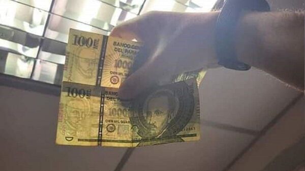 Cómo pillar si estás ante un billete falso de G. 100.000
