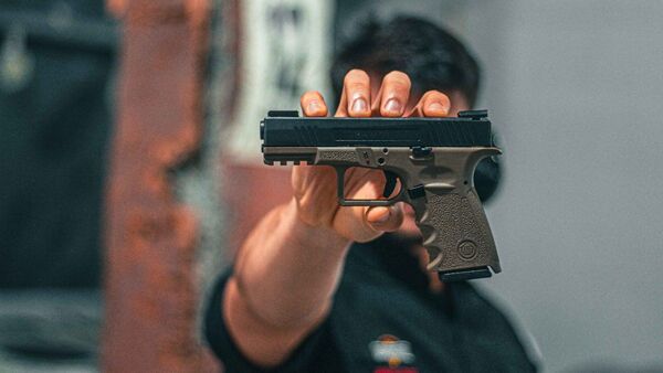 Fiscalía imputa a un policía por cambiar pistola en un asesinato