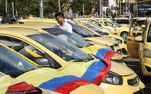 Taxistas colombianos protestan contra el alza del precio del combustible y la inseguridad - MarketData