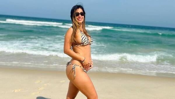 [GALERÍA] ¡Doña del pelotero Ángel Romero pela pancita con biquinazo!