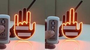 Tunean sus autos con mano led que hace gestos groseros