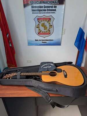 Detienen a policía por presunta reducción e incautaron de su poder guitarra hurtada  - Policiales - ABC Color