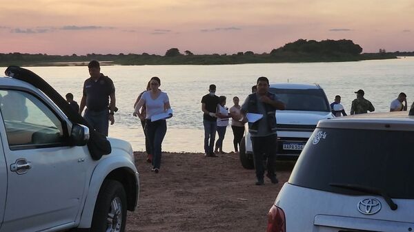 Rescatan cuerpo de menor desaparecido en el rio Paraguay