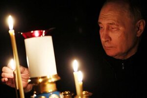 Putin enciende una vela en memoria de las víctimas del atentado de la sala de conciertos