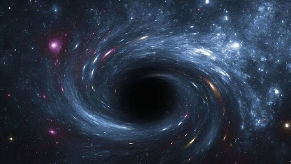 Telescopio James Webb permite a investigadores "asomarse" al agujero negro más distante
