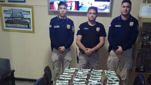 Policía recupera botín robado a casa de cambios y hay dos detenidos
