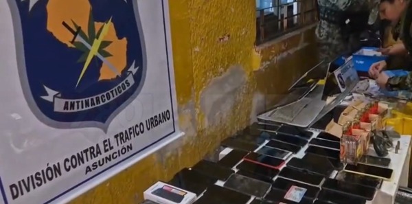 Allanamiento en despensa de Villa Morra: incautan 56 celulares y G. 50 millones - ADN Digital