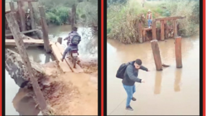 A falta de puente, utilizan cables y tablas para cruzar