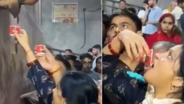 (VIDEO) Devotos hicieron cola para beber agua bendita y resulta que era la condensación del aire acondicionado de la iglesia