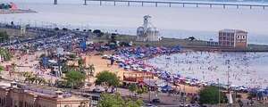 Miles de turistas aplacan el calor el primer día del año en la playa San José de Encarnación - Viajes - ABC Color