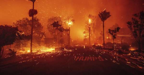 La Nación / Rescatistas buscan cadáveres antes de que el viento arrecie en Los Ángeles