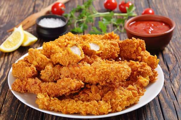 Snack al estilo del Superbowl: receta de chicken fingers con salsa de kétchup - Gastronomía - ABC Color