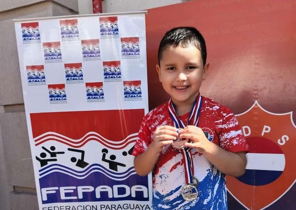 Nacionales de Escuelas de Natación: Sanlorenzano de 7 años se alza con medallas de plata y bronce » San Lorenzo PY