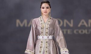 ¡Apénami!  Doctora paraguaya desfiló en el Abu Dhabi Fashion Show