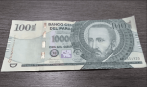 Un billete de G. 100.000 hoy equivale a solo G. 70.000, según economista - Noticiero Paraguay