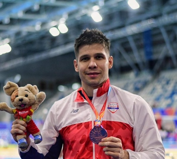 Primer podio paraguayo en juegos deportivos Bolivarianos: Charles Hockin gana bronce en 50 espalda - ADN Digital