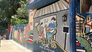 Mural sobre los cien años de la guarania en Punta Karapã