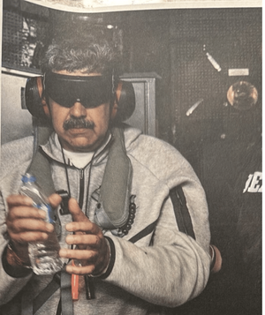 Trump muestra foto de Maduro esposado en buque