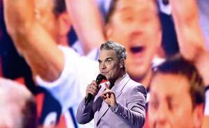 Robbie Williams supera a The Beatles en las listas británicas