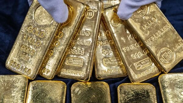 El oro roza los 5.600 dólares, nuevo máximo, y la plata supera los 119 dólares