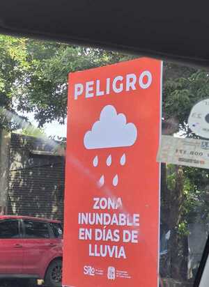 Instalan cartel de “zona inundable” en Pastora Céspedes tras recientes lluvias » San Lorenzo PY
