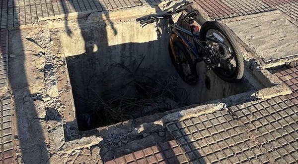Niño cae con su bici en un registro destapado en la Costanera de Asunción
