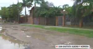 Diario HOY | Vecinos organizan hamburgueseada para reparar calle en Mariano Roque Alonso