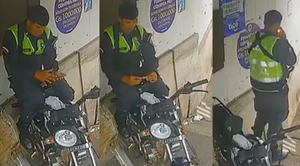 Policía es captado in fraganti preparándose un “porro” en pleno servicio